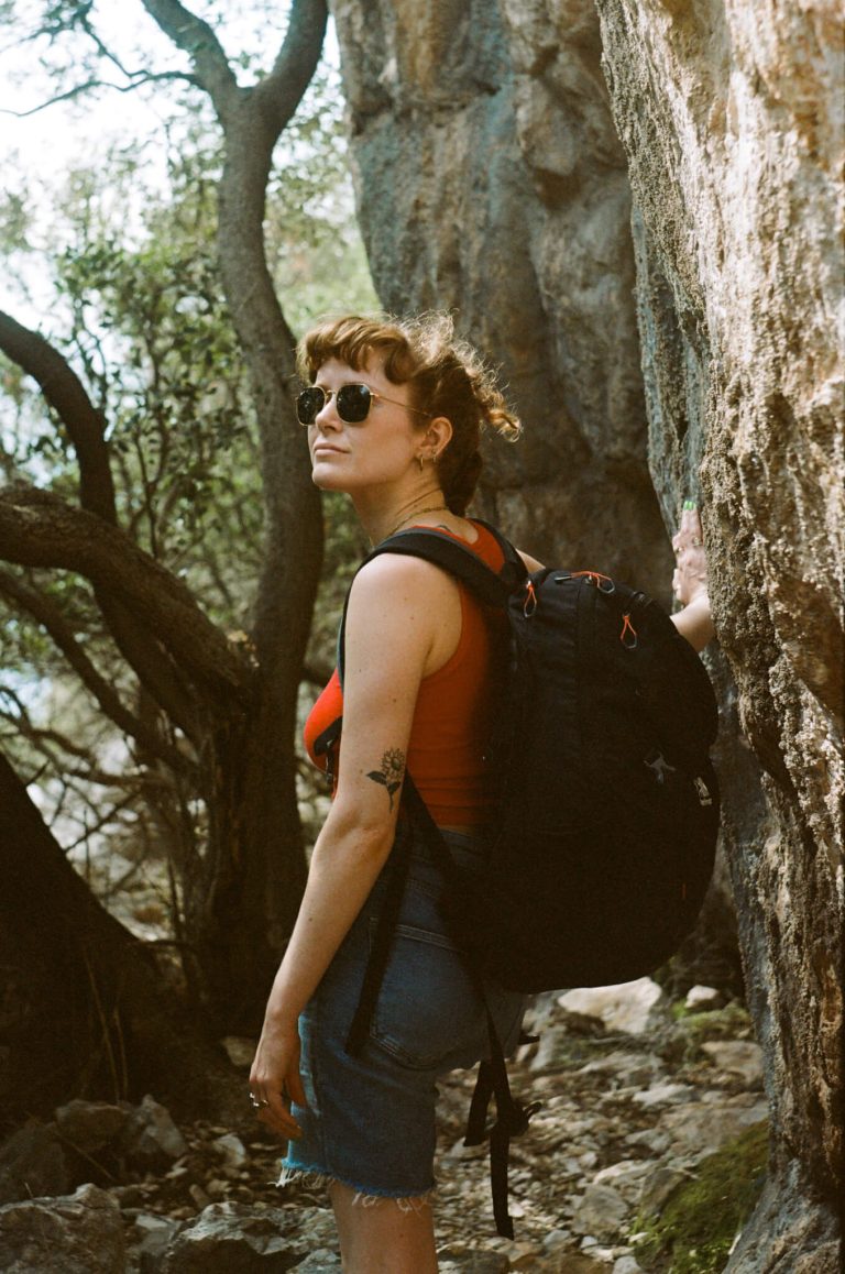 A photo of a woman with a backpack